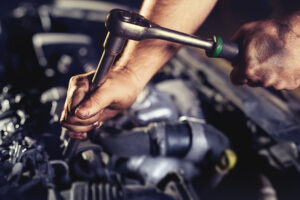 Repairing diesel engine in auto repair shop